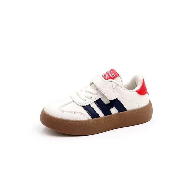 Stylish and comfortable unisex shoe, with great flexibility and a practical design with Velcro strap. - IRRAKIDS