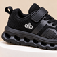 Baskets de sport pour enfants en maille avec empiècements élégants et semelle épaisse ajourée, style décontracté pour le quotidien, disponibles en noir, gris et bleu marine