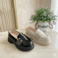"Stylish loafers for girls - a luxurious touch to a sophisticated look!"