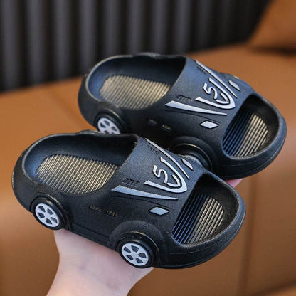 Slippers with a soft, non-slip sole for young children in a cartoon car design with LED lighting - IRRAKIDS