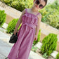 "Stylish girls' jumpsuit with a waist belt - perfect for summer occasions"