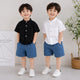 Stylish kids' outfit with a modern design, featuring a button-up shirt and denim shorts – perfect for a comfortable and coordinated look on sunny days!