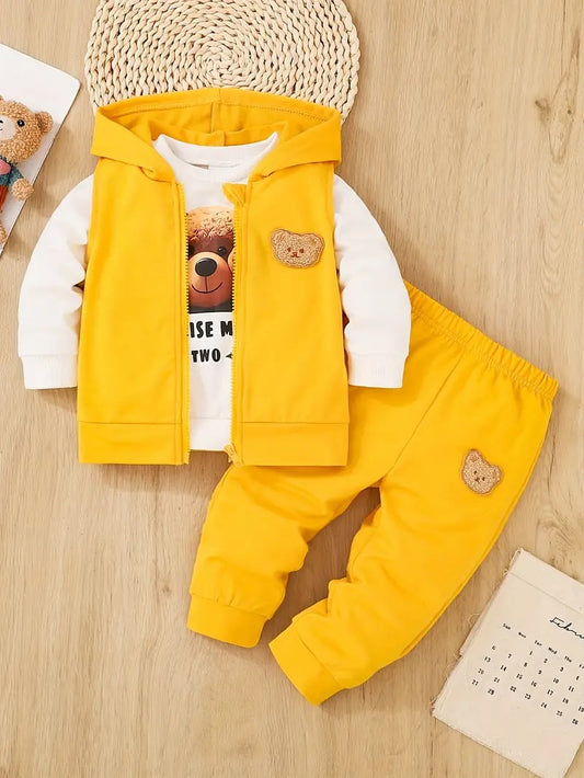 Ensemble 3 pièces pour garçon et fille : un t-shirt avec imprimé ours, un sweat à capuche et un pantalon de sport.Ensemble 3 pièces pour garçon et fille : un t-shirt avec imprimé ours, un sweat à capuche et un pantalon de sport.