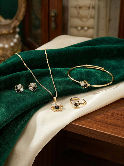 Ensemble de bijoux en or anti-ternissement en forme de trèfle à quatre feuilles – Couleur durable et résistante à l'oxydation, orné de pierres CZ noires et transparentes (ensemble de 5 pièces)